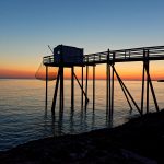 Carrelet et soleil couché